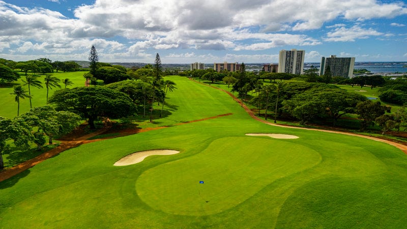 Pearl Country Club golf course on Oahu offering sweeping views of Pearl Harbor, rolling fairways, and island breezes